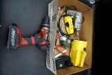 Box of tools, stud Finder, flashlight, drills, batteries, wrenches, and more.