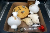 Glass lamp shades, keys, conch shells, art work.