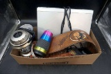 Native pride, large leather belt, Lantern, travel mugs, DVD player.