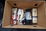Handheld sewing machine, hospital, ice cap, postcard, candle lamp.  Vintage camera.