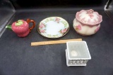 Plates, candles, Creamer, canister.