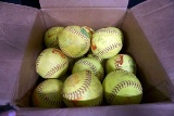 Large box full of softballs.