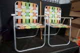 Vintage webbed lawn chairs.