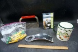Kitchen supplies, egg piercer, tea infuser, cup, and more.