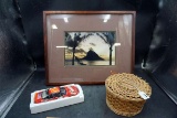 Diecast stock car, basket, artwork.