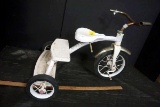 White metal tricycle. Radio flyer.