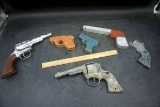 Toy guns.