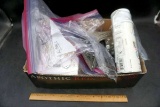 Box of tools, hardware, window insulator, screws, foam sealer, and more.