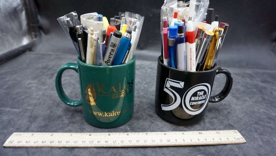 2 - Mugs W/ Assorted Pens
