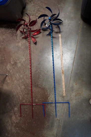 2 - Metal Floral Spinners (Red One Has 2 Petals That Are Detached)