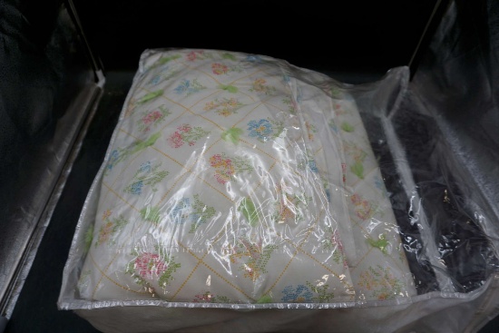 White Floral Blanket In Plastic Bag