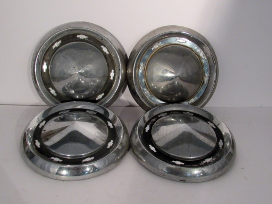 4 Vintage Chevrolet Hubcaps