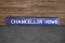 Chancellor Hdwe Painted Double-Sided Tin Sign
