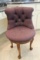 Purple upholstered chair / claw feet
