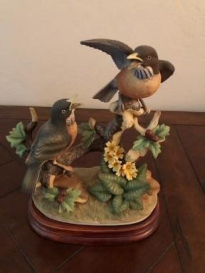 Porcelain birds chirping