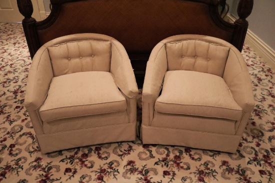Two tan armchairs