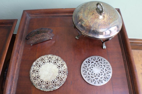 Assortment of kitchen supplies?napkin holder, food trays, and pan with lid