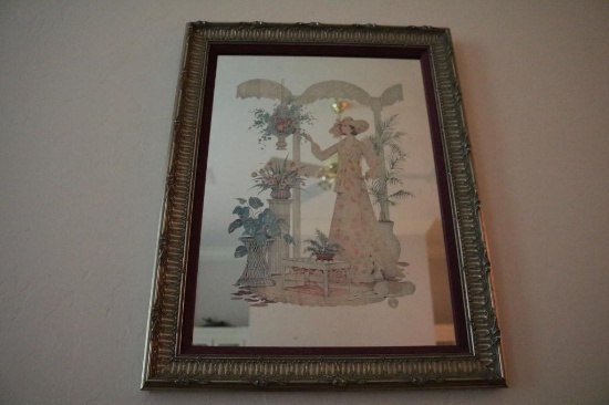 Mirror with a woman tending to her garden