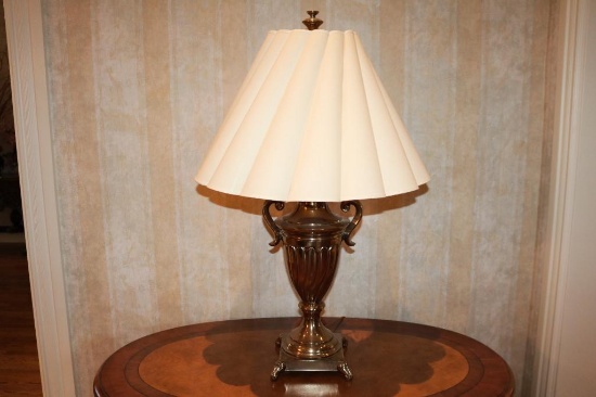 Gold colored lamp with white lampshade (34.5" tall)