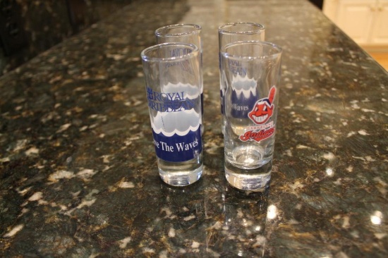 4 Collectable shot glasses 3-Royal Caribbean 1- Cleveland Indians