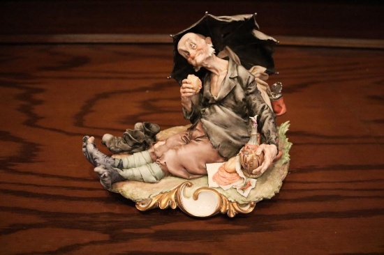 Porcelain piece of a man sitting down having lunch by G Cappe ITALY, 99023
