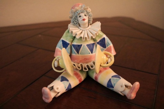 Clown posing with instruments