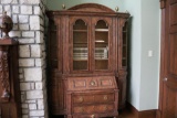 Armoire with multiple shelving tiers