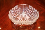 Decorative glass bowl with star design in the middle
