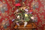 Large floral arrangement in Bronze tone vase