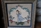 Needle work of women dancing