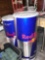 Two Red Bull display coolers one electric plug in one ice bin