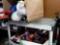 Air hockey table box full of toy electric guitars stuffed animals box full of action figures