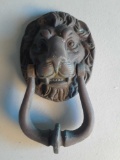 Brass lion head door knocker