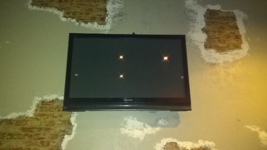 Panasonic 50" HD flat screen tv with a stationary wall bracket