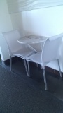 White plastic outdoor/Indoor chairs