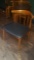 Wooden dining room chair with blue vinyl cushion seat