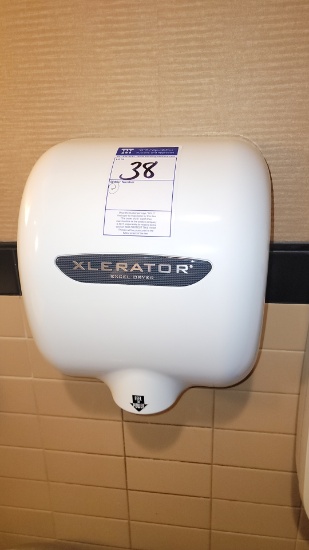 Xcerator wall mounted electric touchless hand dryer (women's rest room)