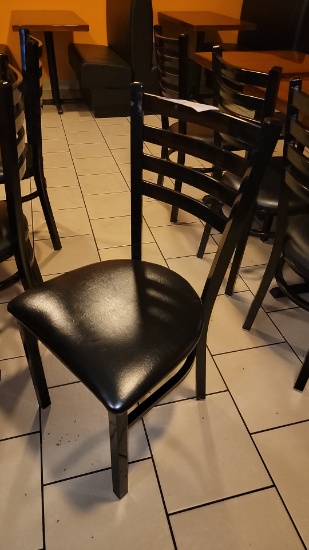 Black metal dining room chairs with vinyl cushion seats