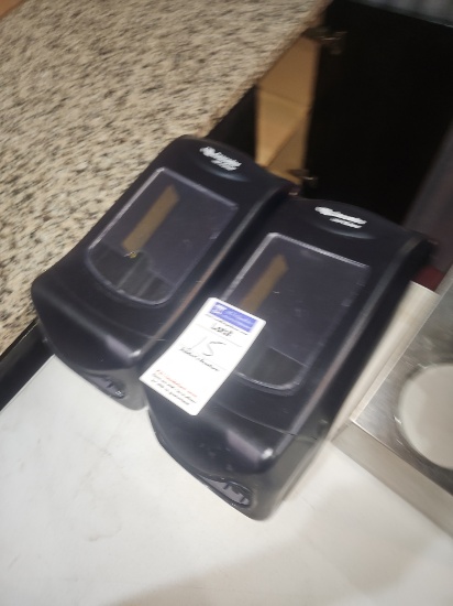 Wall mounted napkin dispenser