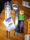 Assorted beer tap heads