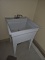 Poly utility sink with faucet