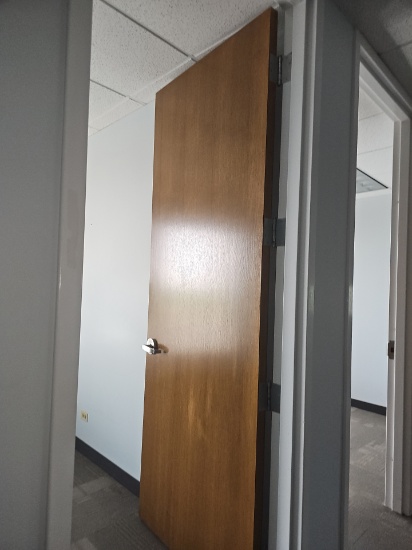 Wooden doors with metal frame with hardware