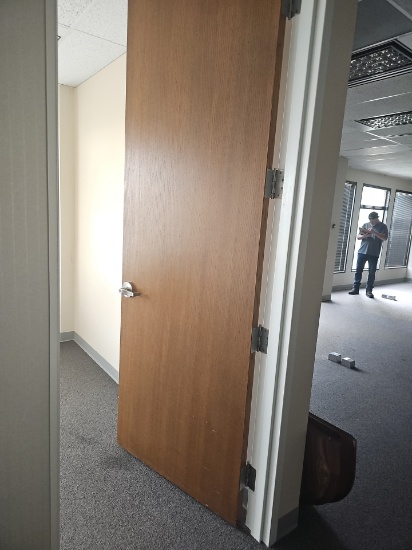 Wooden doors with metal frame with hardware