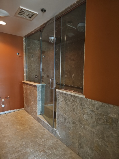 Glass framed steam shower system