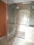 Glass framed steam shower system