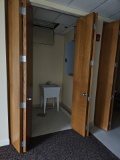 By fold wooden doors with hardware