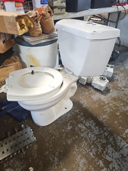 Used toilet with tank