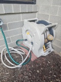 Out door hose reel with paving bricks