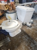 Used toilet with tank