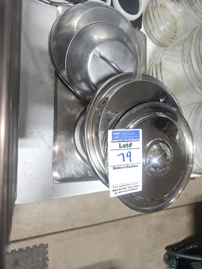 Assorted lids and round stainless steel covers